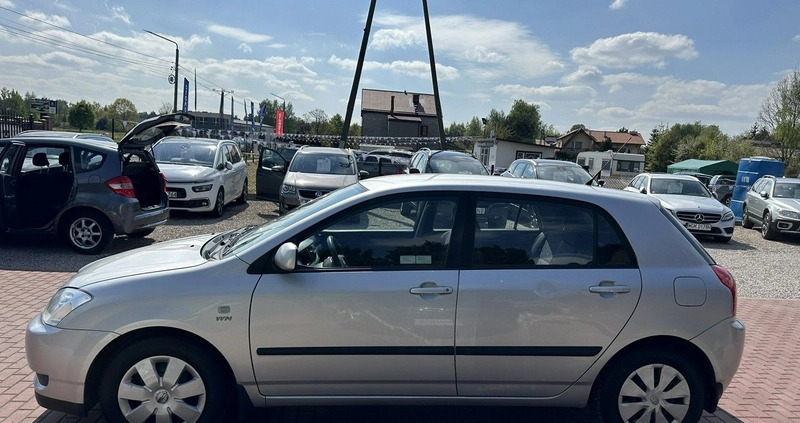 Toyota Corolla cena 8800 przebieg: 175000, rok produkcji 2003 z Głubczyce małe 137
